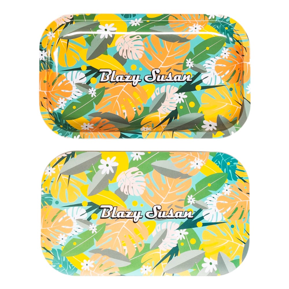 Top-down view of two matching medium Blazy Susan Metal Rolling Tray pieces with a colorful tropical leaf and floral pattern.