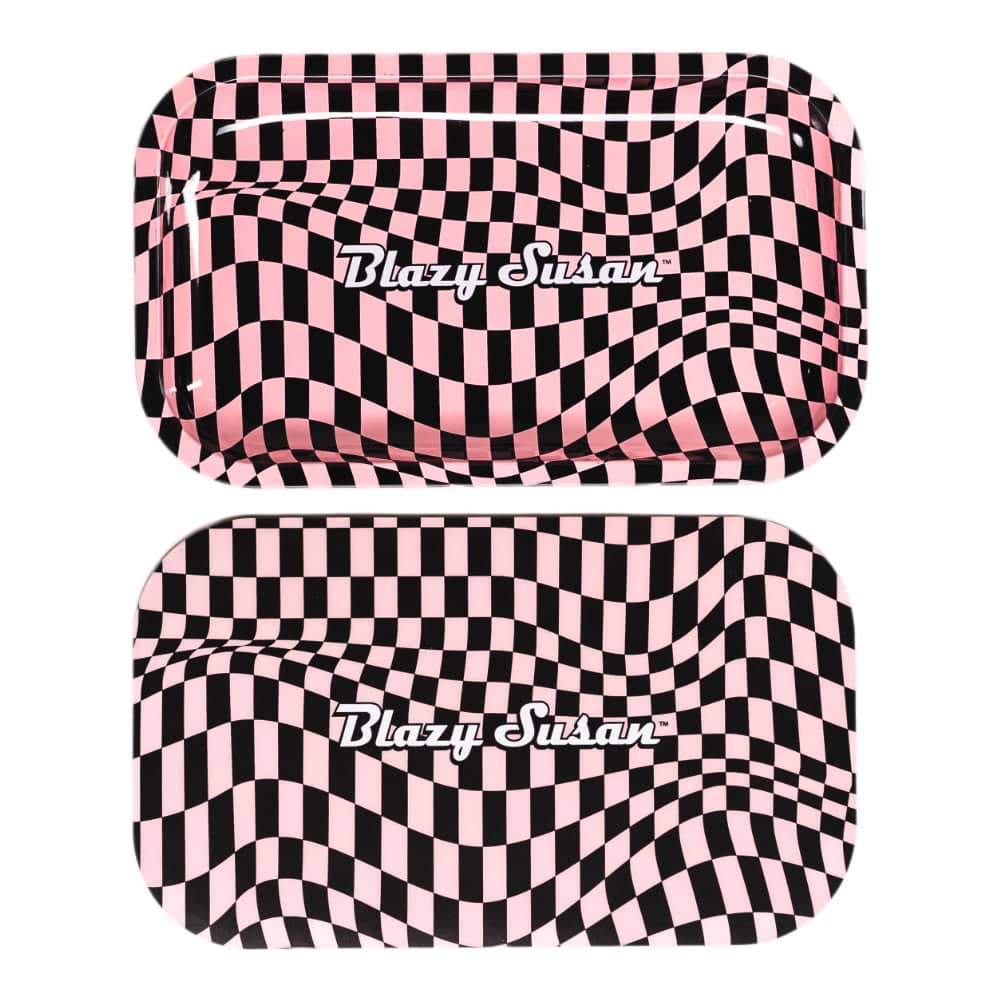 Top-down view of two medium Blazy Susan Metal Rolling Tray pieces with a pink-and-black trippy checkerboard pattern and centered white logo.