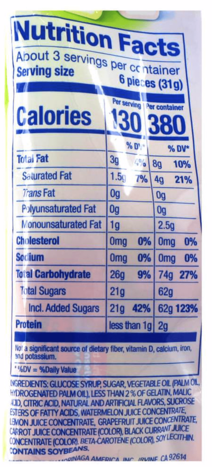 A close-up of the nutrition facts label for Hi-Chew Fruity Chewy Candy, displaying values for fats, carbohydrates, and other nutritional information.