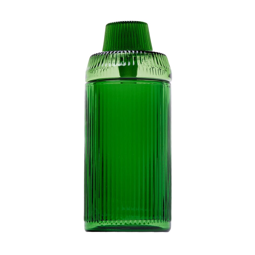 Green glass cannabis oil applicator bottle.