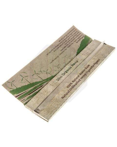 A stack of Organic Hemp Rolling Papers is displayed against a muted background, showing the paper’s textured surface and packaging details.