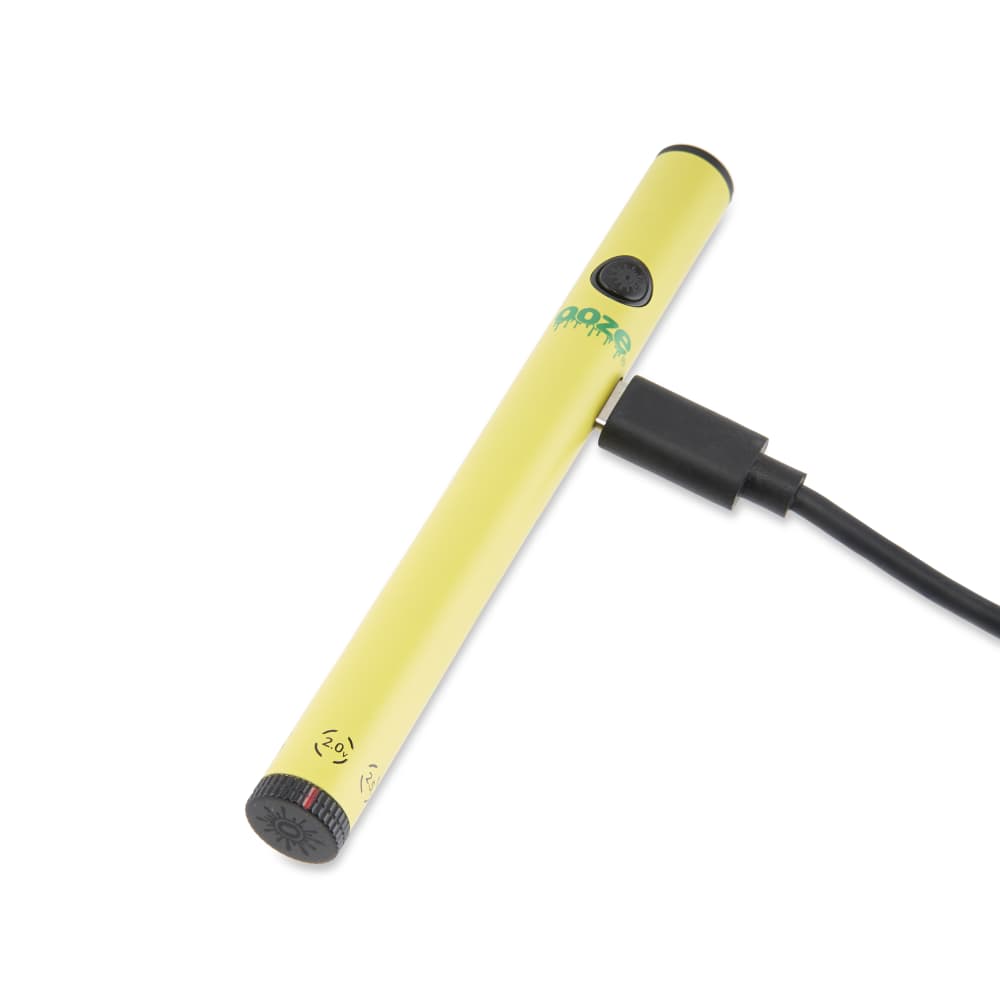 A close-up shows the Twist Slim Pen 2.0 510 Thread Vaporizer Battery with a USB charging cable plugged into its side.