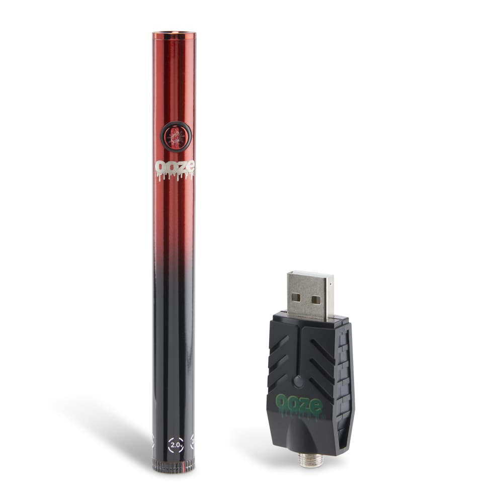 A close-up, angled view of the Twist Slim Pen 2.0 510 Thread Vaporizer Battery, showing its metallic finish and USB connection.