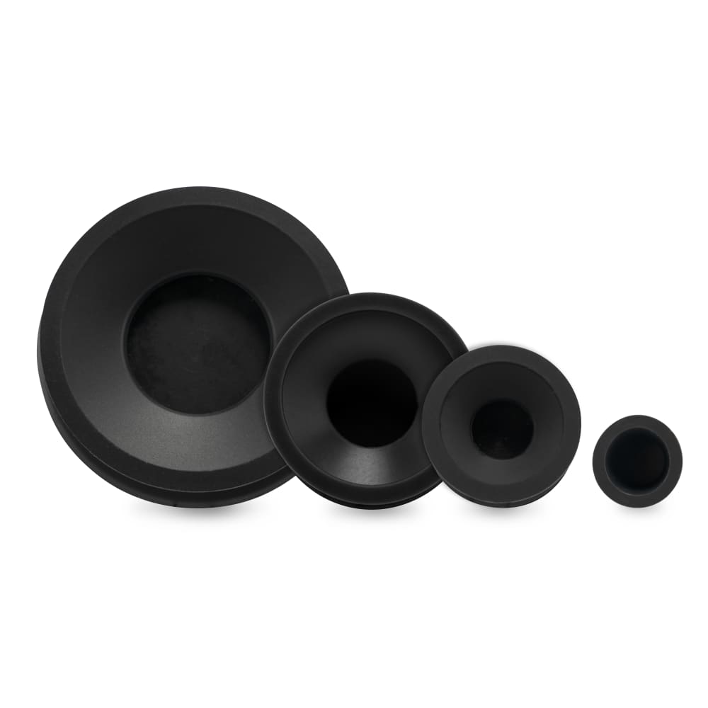 Angled lineup of four black Ooze Resolution Caps in decreasing sizes against a white background.