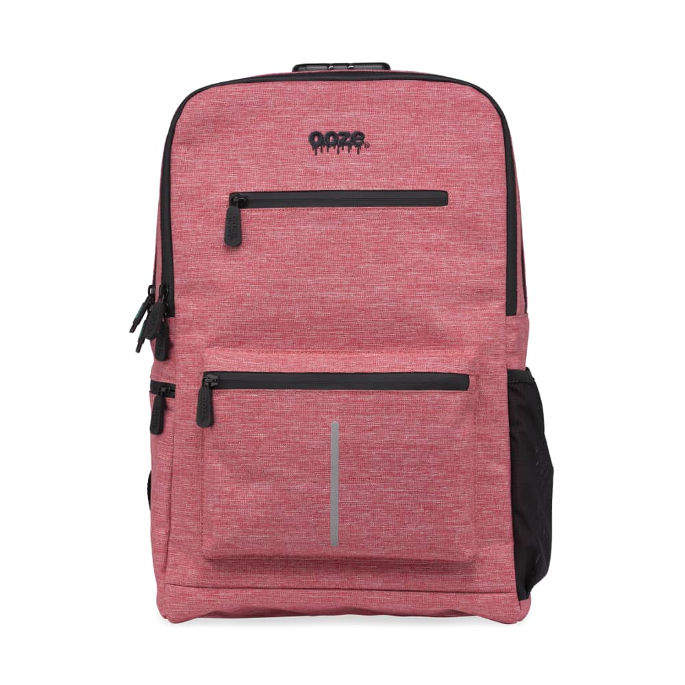 Front view of the Ooze Traveler Smell Proof Backpack, a dark grey bag with multiple zippers and a textured fabric pattern.