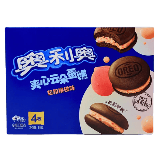 A close-up of Oreo Cakesters - Peach, showing a stack of peach-colored cakes with the Oreo logo visible on top.