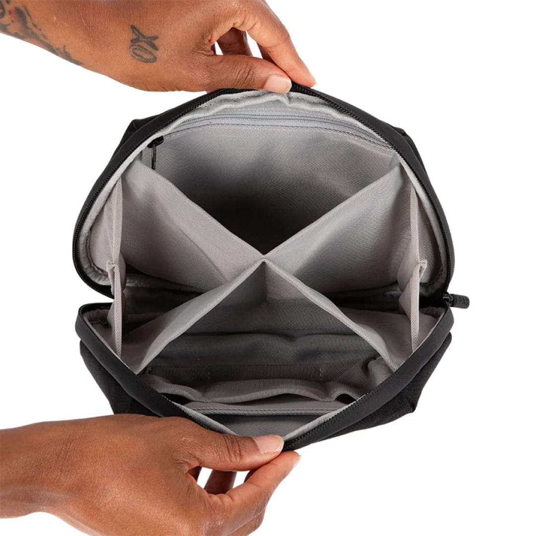 A top-down view showcases the interior of the open PAX Smell Proof Bags, revealing a partitioned, dark gray lining.