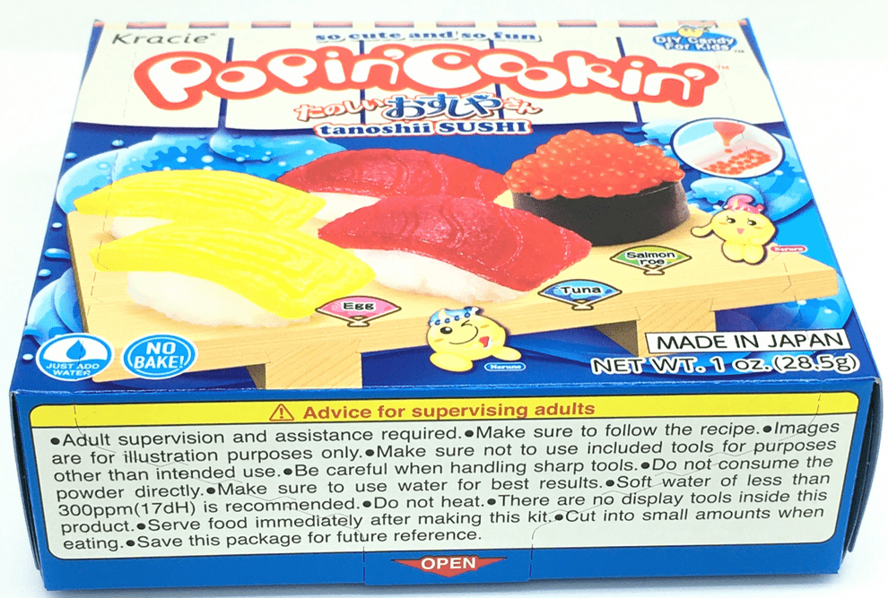 Front view of the DIY Candy Making Kit - Tanoshii Sushi packaging, featuring colorful cartoon sushi designs and Japanese text.