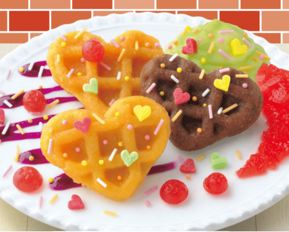 A slightly angled, top-down view of the **DIY Candy Making Kit - Tanoshii Waffle** candies, decorated with sprinkles on a white surface.