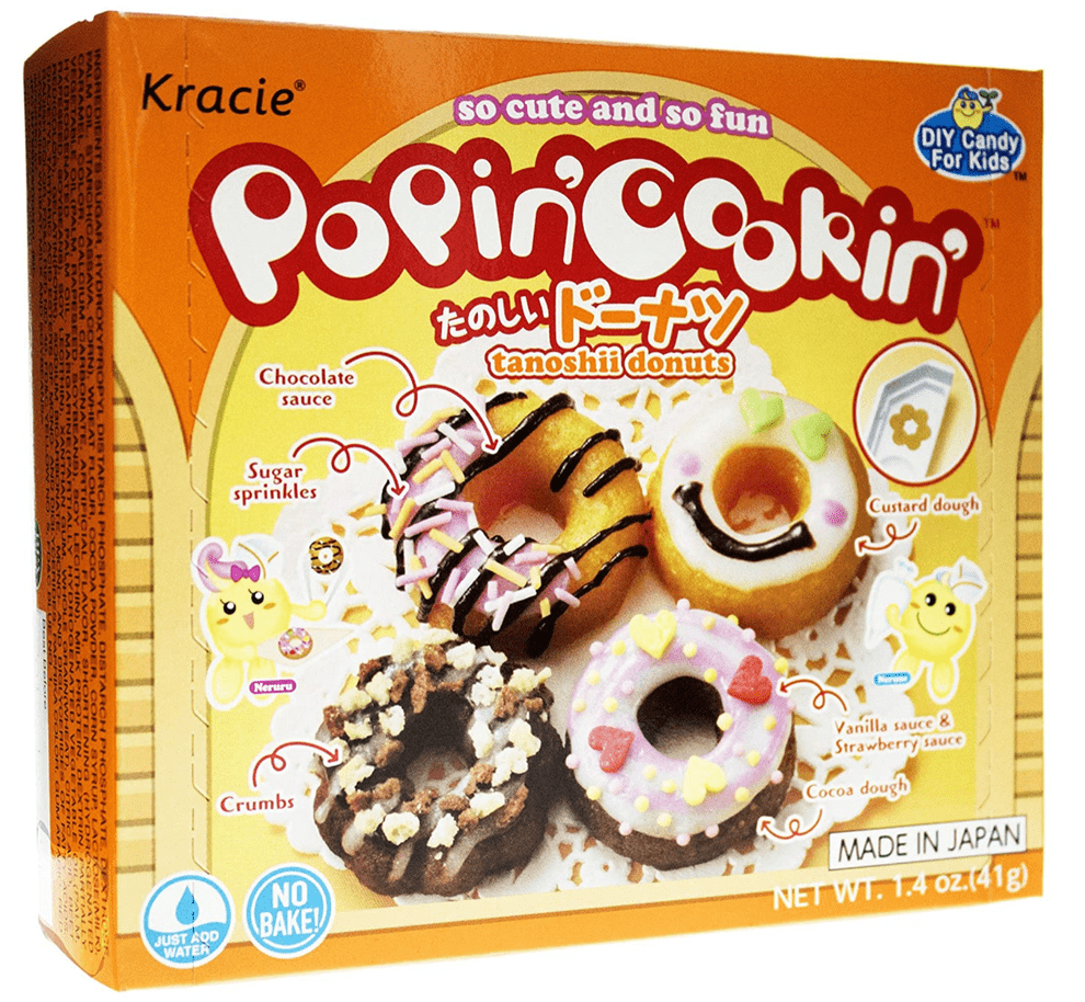 A vibrant, close-up view of the Kracie Popin Cookin DIY Candy Making Kit Donuts, showcasing a partially completed, colorful confection with sprinkles.