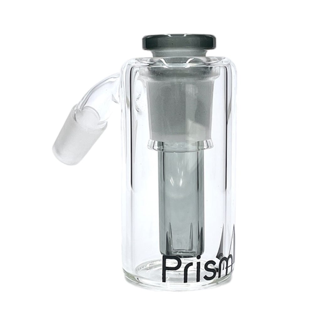 Front view of the Prism Beaker Base Ash Catcher showing its clear cylindrical glass body, gray inner stem, angled joint at left, and partial "Prism" logo at the base.