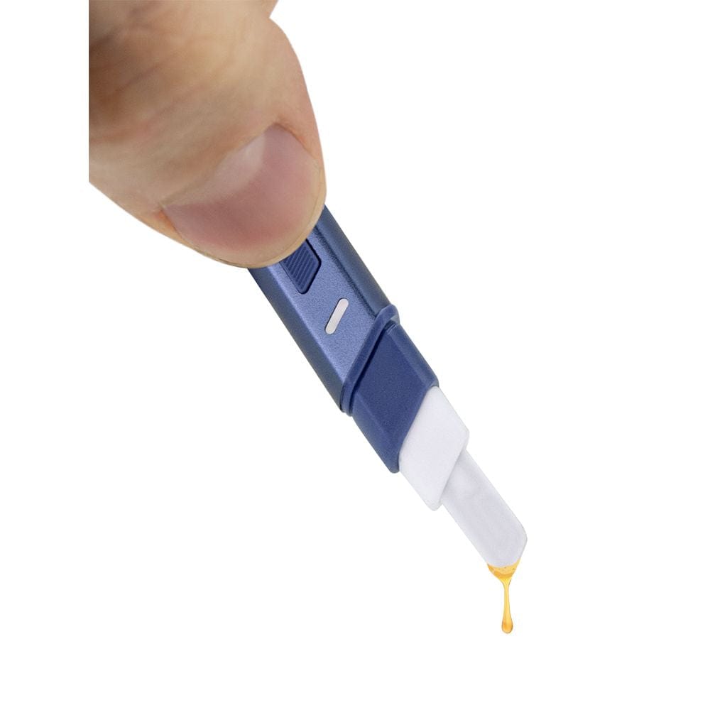 Close-up view of the Limited Edition Storm Hot Knife Electric Heated Loading Tool being held, highlighting its blue and white design.