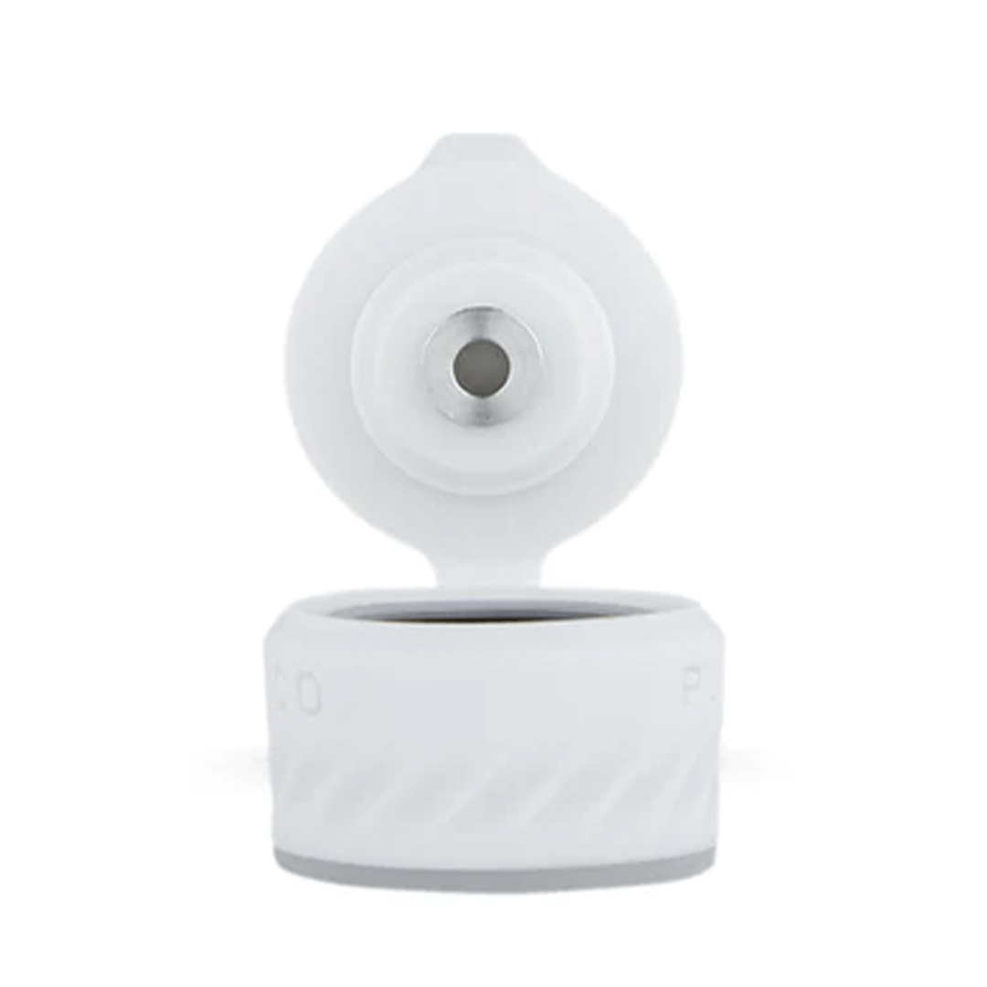 Front-facing close-up of the Desert Puffco Peak Pro Joystick Cap with its hinged top open, showing the central metal insert and textured white exterior.