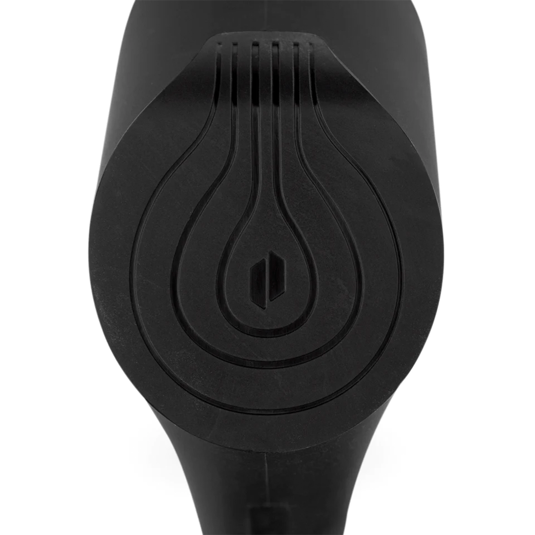 Top-down close-up of the black Puffco Proxy Travel Pipe mouthpiece area, showing concentric teardrop grooves and a centered logo.