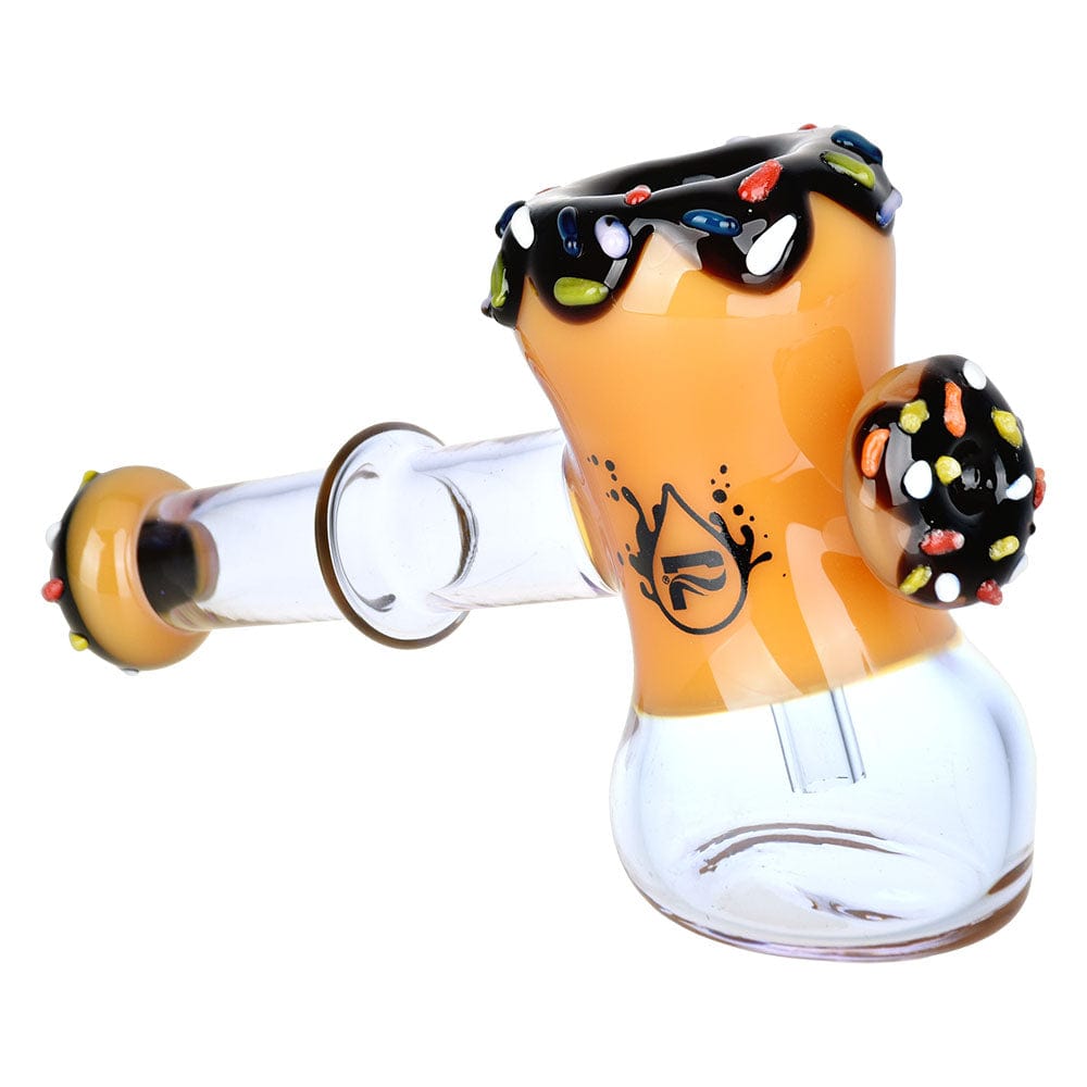 Front view of the Donut Hammer Bubbler, a colorful glass piece resembling a frosted donut with sprinkles.