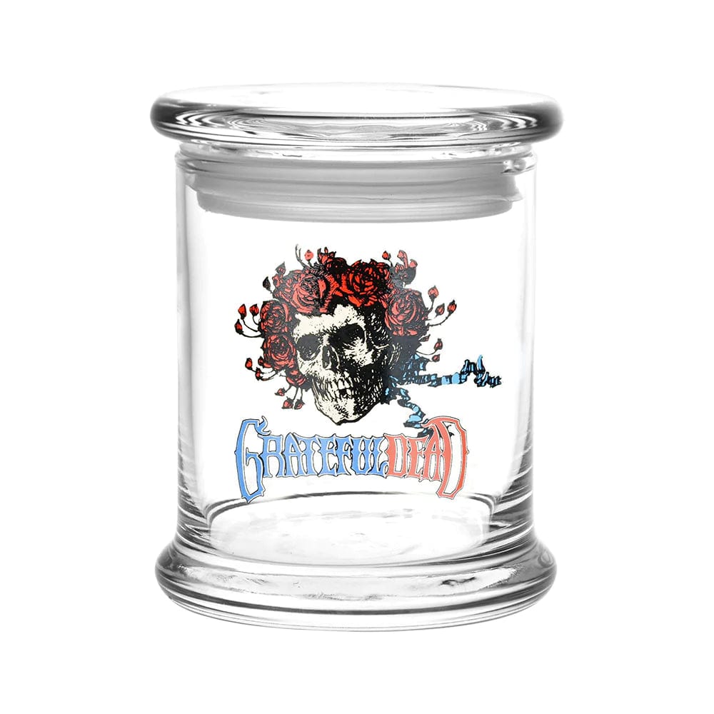 Front view of the Grateful Dead x Pulsar Pop Top 1/2oz Jar, displaying a colorful graphic design on clear glass.