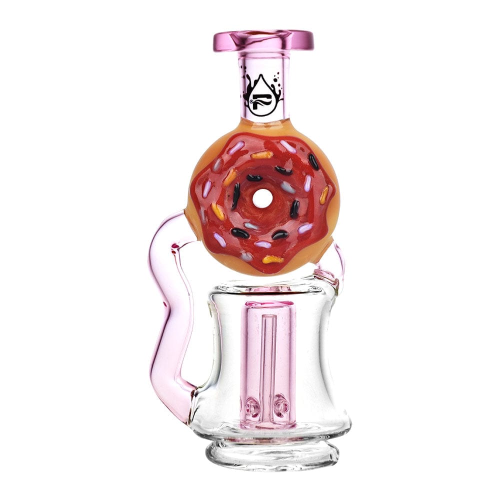 A close-up, angled view of the Donut Recycler Attachment For Puffco Peak/Pro, showcasing its colorful, layered glass design.