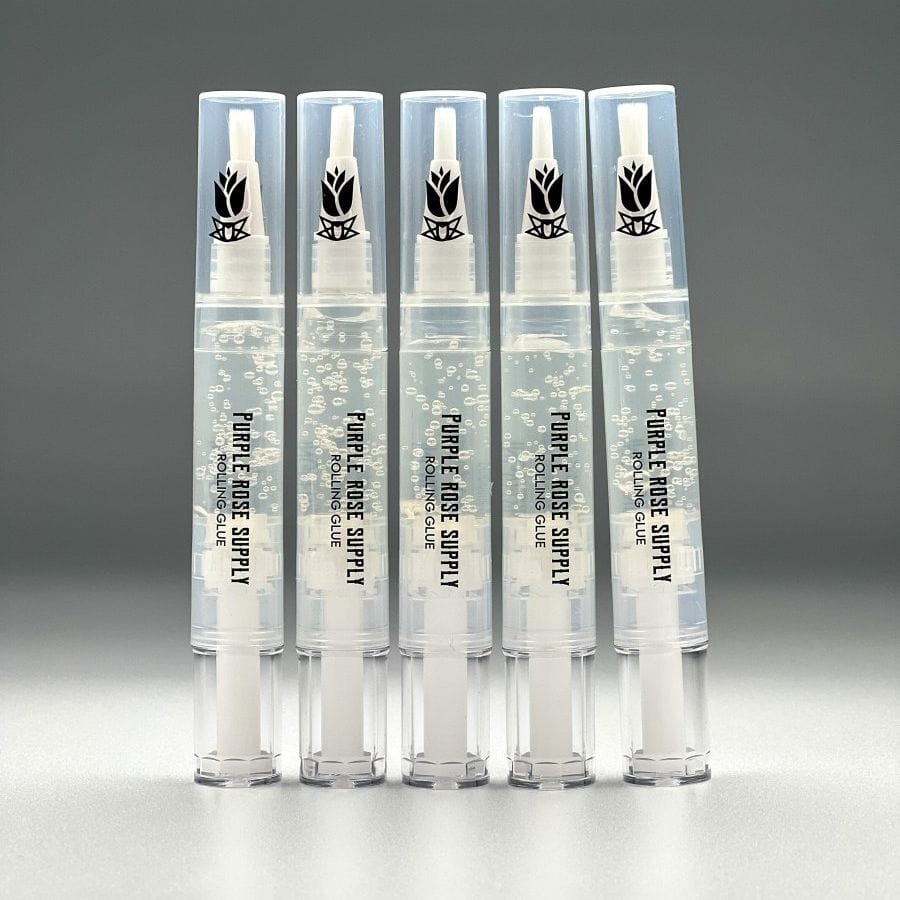 Five clear 4ml Cannagar & Blunt Rolling Glue pens (Cannagar & Blunt Rolling Glue - 4ml) standing upright in a row against a soft gray background.