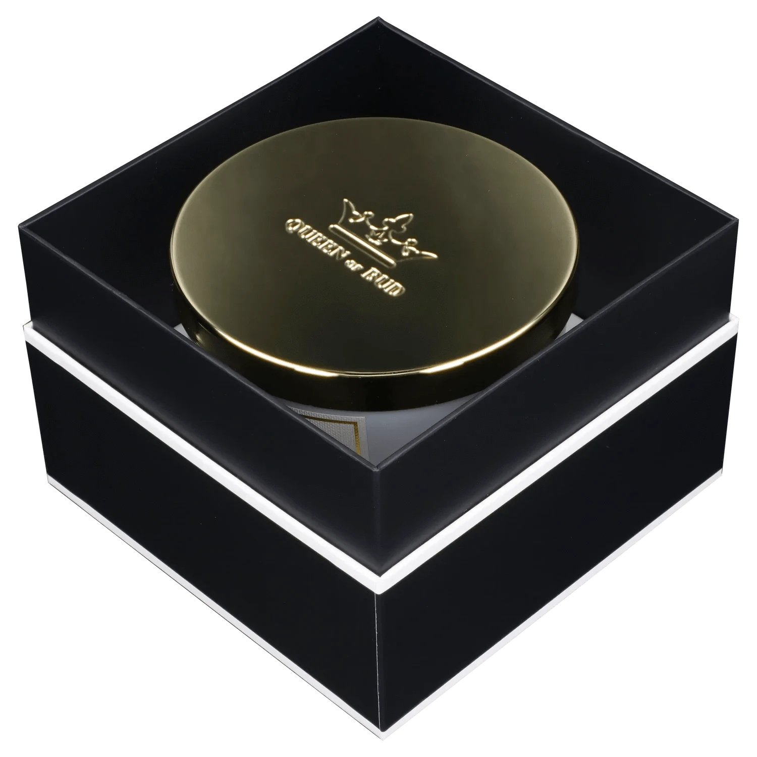 Top-down view of a gold-lidded Queen of Bud Candle nestled inside a black gift box with white trim, the lid embossed with a crown logo.