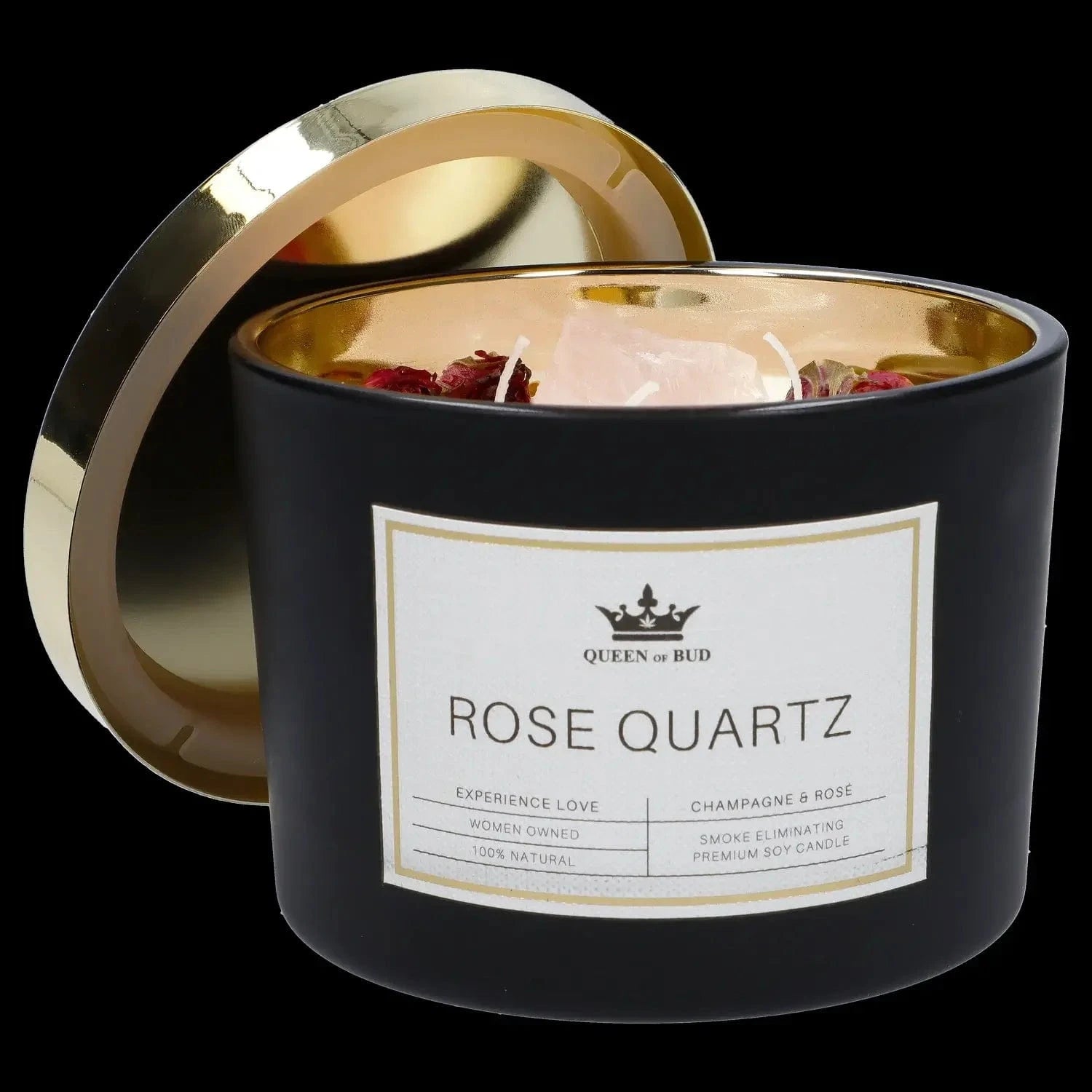 Angled close-up of a black and gold jar candle with rose petals and a pink crystal, labeled "Queen of Bud Candle."