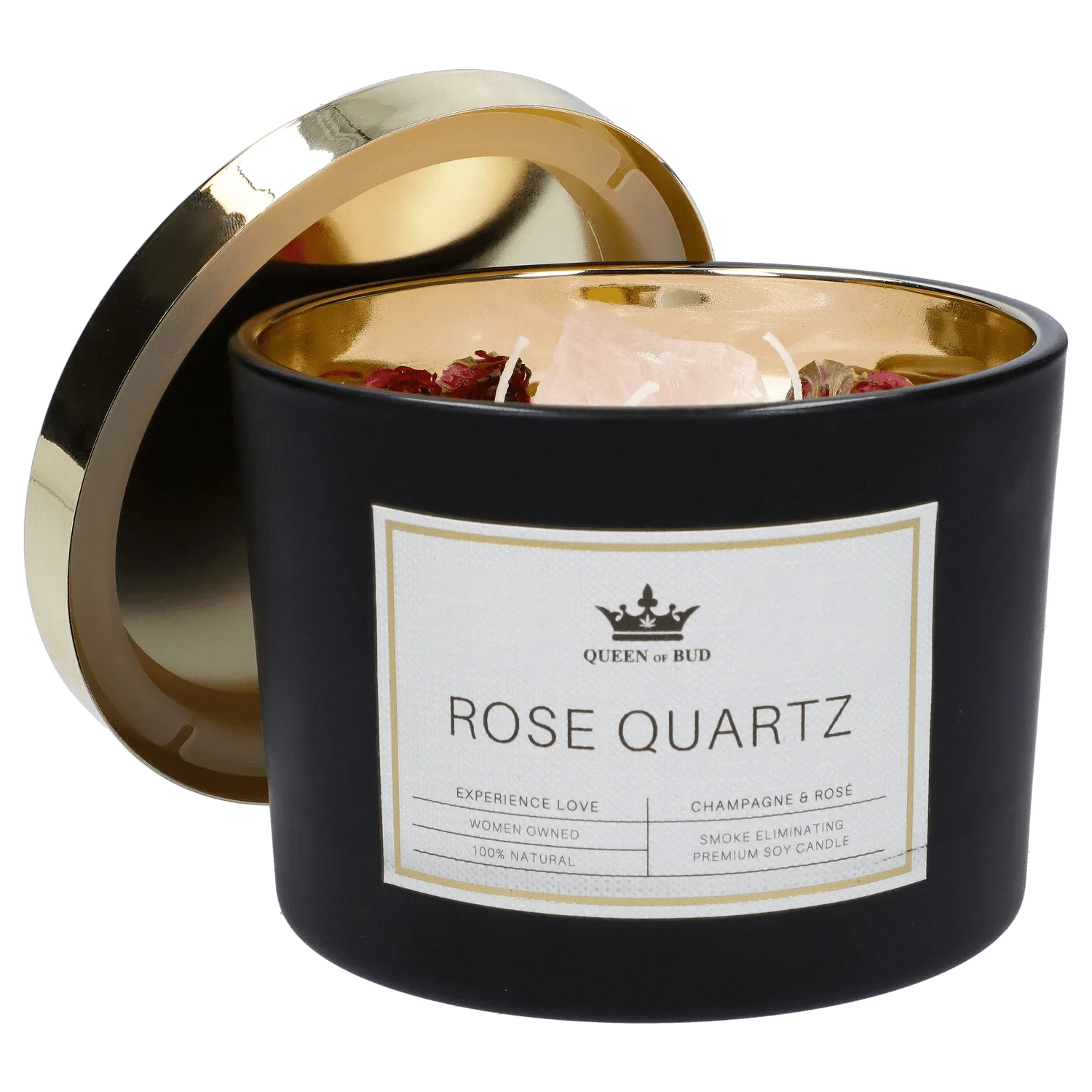 Close-up three-quarter view of the Queen of Bud Candle showing a black jar with a gold interior lid, visible rose petals and a central rose quartz crystal.