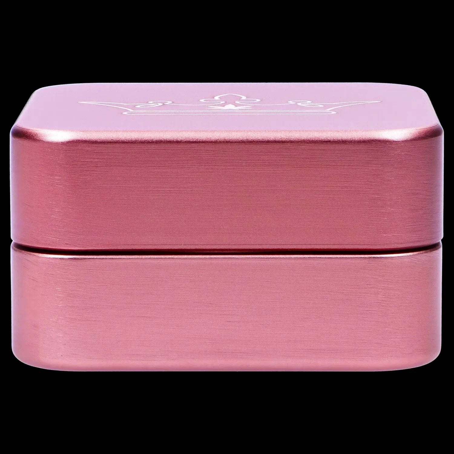Close-up front view of the pink QOB 2-Piece Grinder - 55mm showing its brushed metal finish and squared edges against a black background