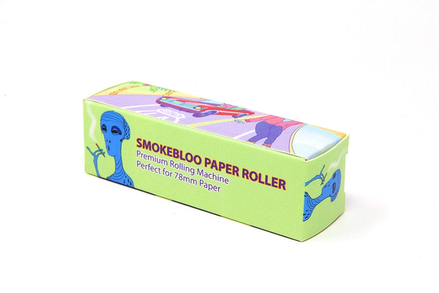 Angled studio shot of a lime-green Quik Wikk 78mm Rolling Machine Smoke Bloo Alien box with purple artwork and a blue alien illustration on a white background