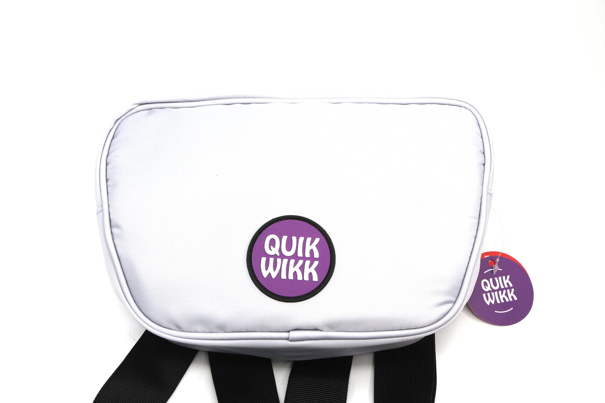 Top-front view of the blue Quik Wikk Fanny Pack showing its rounded zippered face, central purple logo patch, and black straps below.