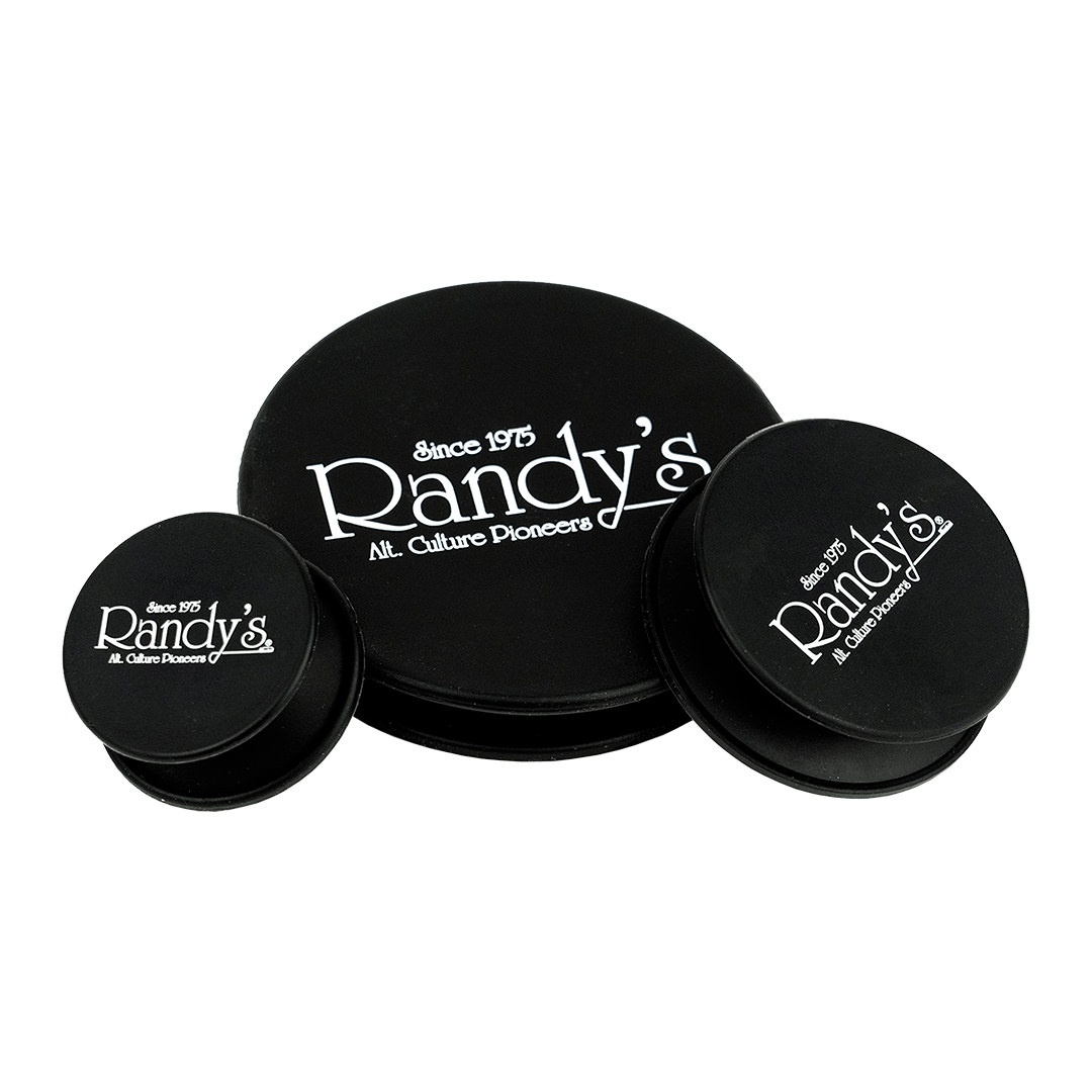Three black Randy's Black Label Cleaning Caps photographed from above in a triangular arrangement on a white background.