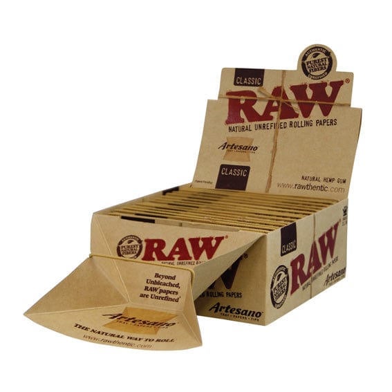 A slightly angled view of the "RAW "Artesano" Papers + Tips" package, displaying the branded text on its cardboard exterior.