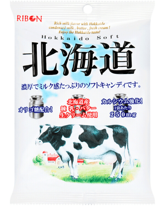 Close-up of the “Real Hokkaido Milk and Cream Calcium Enriched Soft Candy” packaging with Japanese text and a soft, creamy color scheme.
