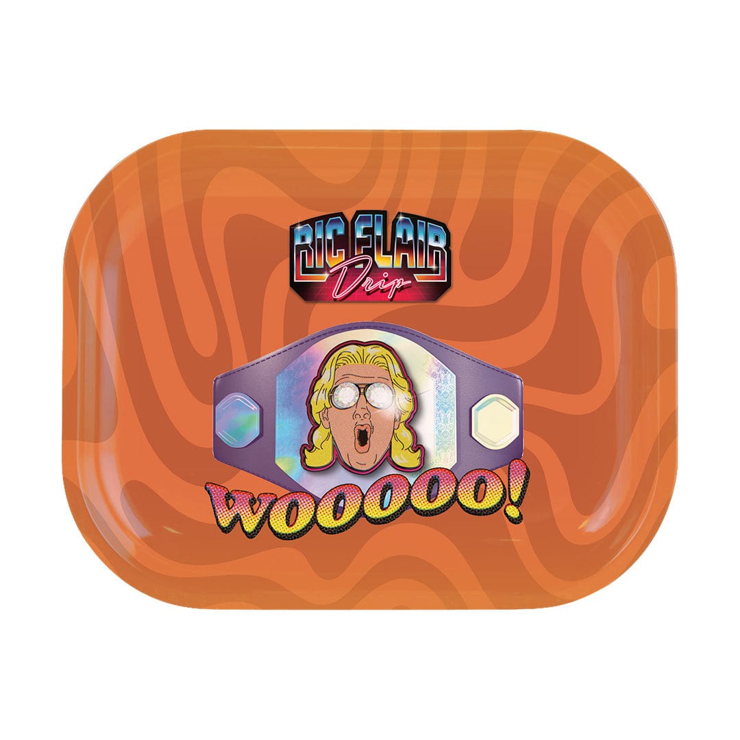 A top-down view of the Ric Flair Drip Rolling Trays with a vibrant, colorful background pattern.