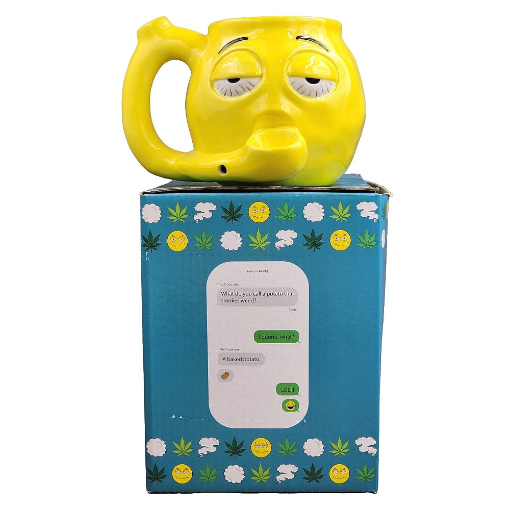 A brightly lit, angled view of the Stoned Emoji Pipe Mug & Stash Jar Bundle, featuring a smiling emoji design.