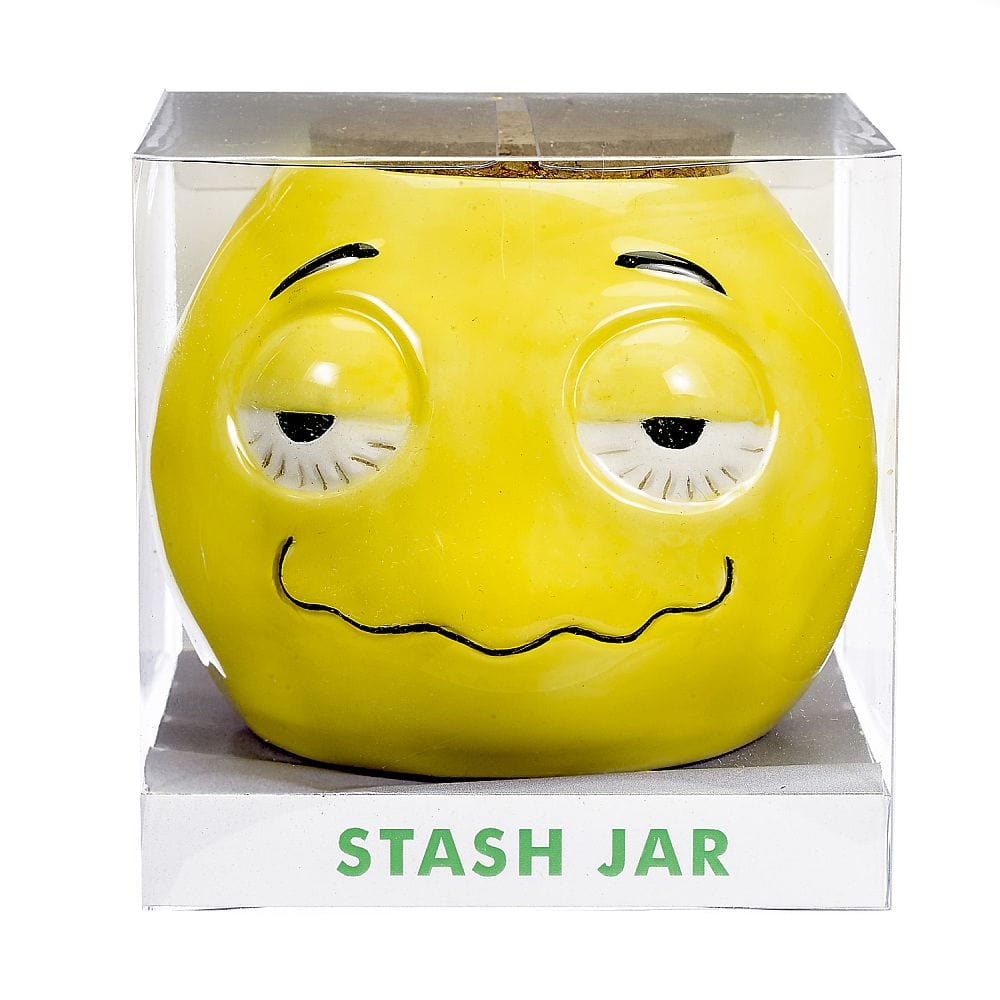 Front view of the Stoned Emoji Pipe Mug & Stash Jar Bundle, presented in clear packaging, showcasing its playful design.