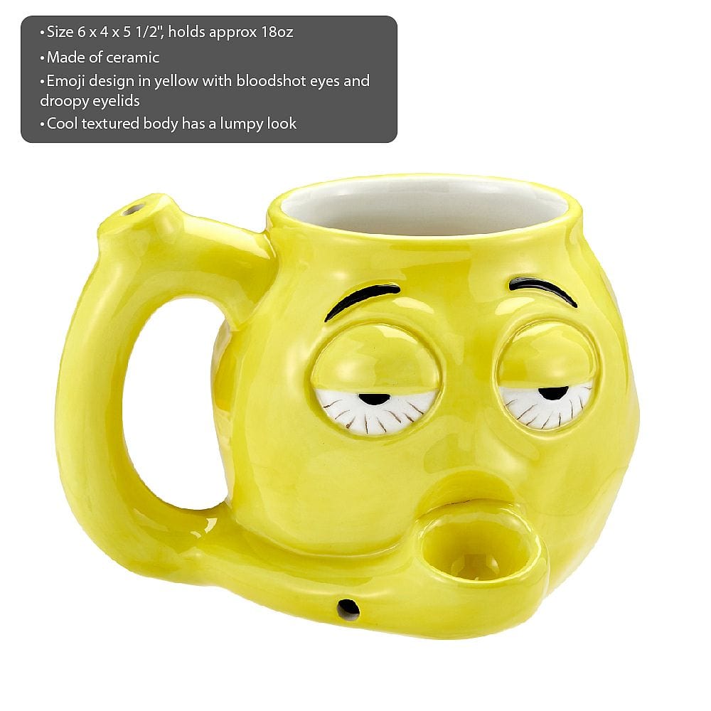 Front view of the Stoned Emoji Pipe Mug & Stash Jar Bundle, a yellow ceramic mug with a whimsical, cartoonish face.