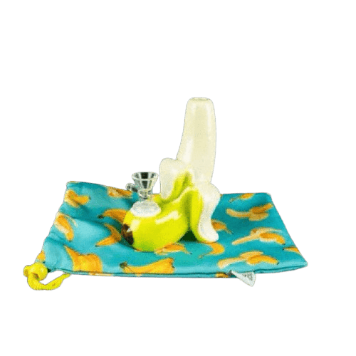 Front view of the Going Bananas Bubbler shaped like a peeled yellow banana sitting on a blue drawstring cloth patterned with bananas.