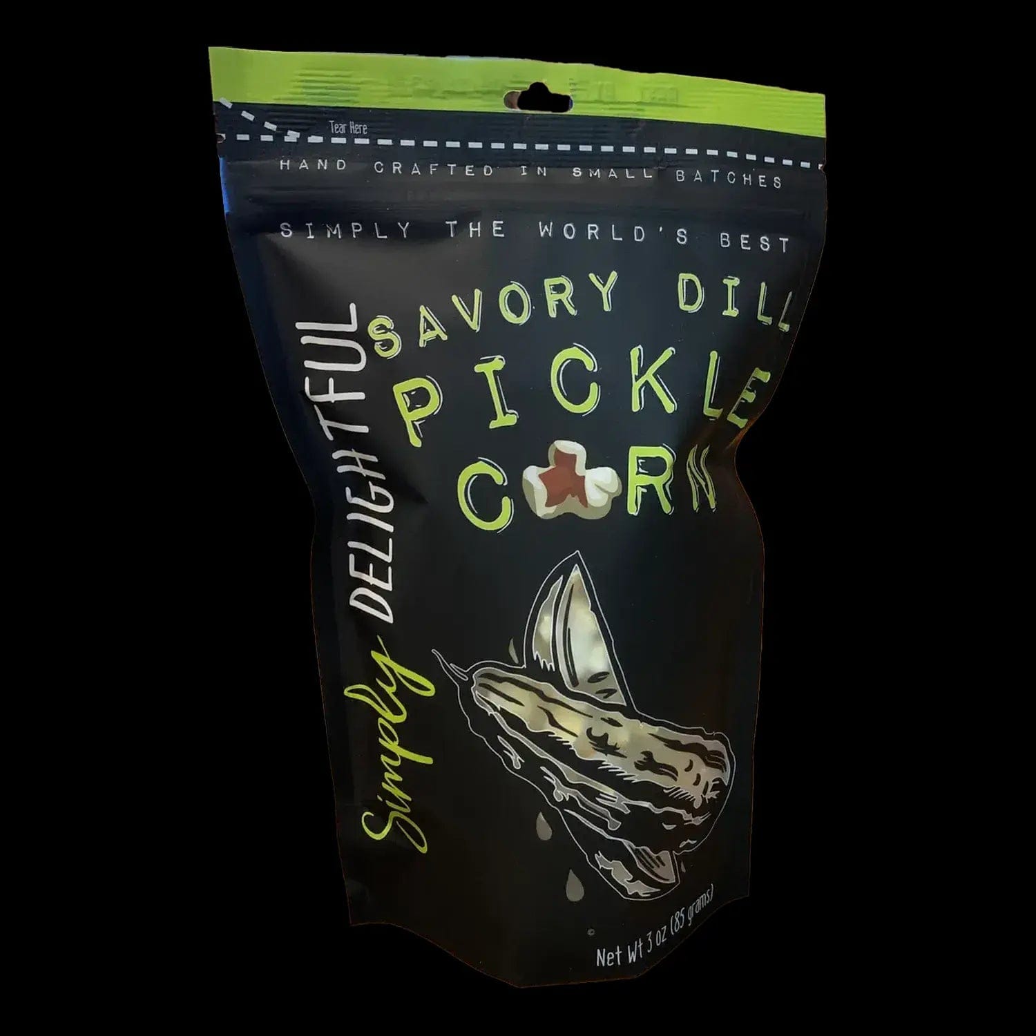 A close-up of Simply Delightful Savory Dill Pickle Popcorn in a clear bag, showing the textured popcorn pieces inside.