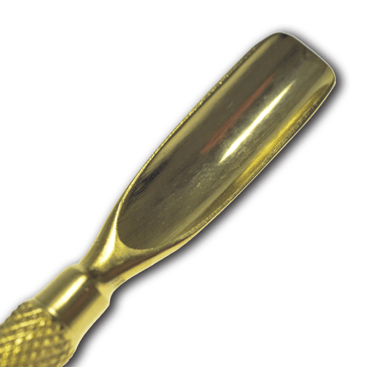 A close-up, angled view of the Gold Digger Dabber, showcasing its metallic finish and curved tip.
