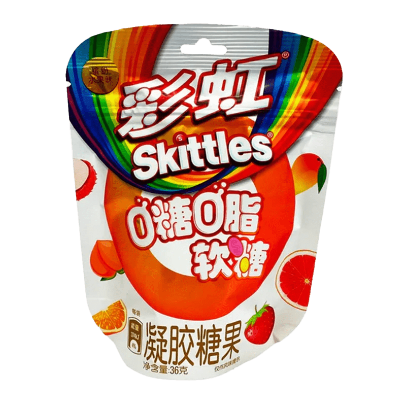 A front view of Skittles - Zero Sugar Gummies - Mixed Fruit packaging with colorful graphics and a transparent bag displaying the gummies inside.