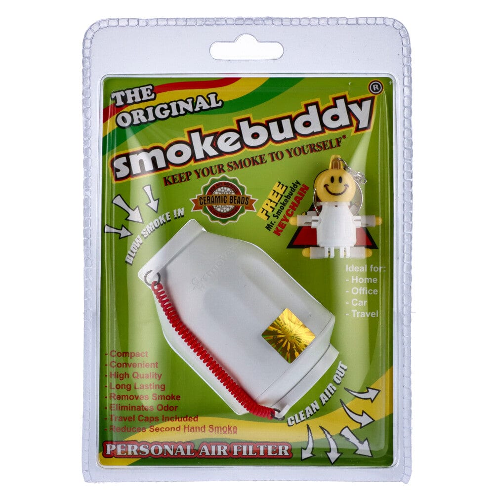 A close-up of the Smoke Buddy Personal Air Filter packaging, displaying bright graphics and text on a clear plastic case.