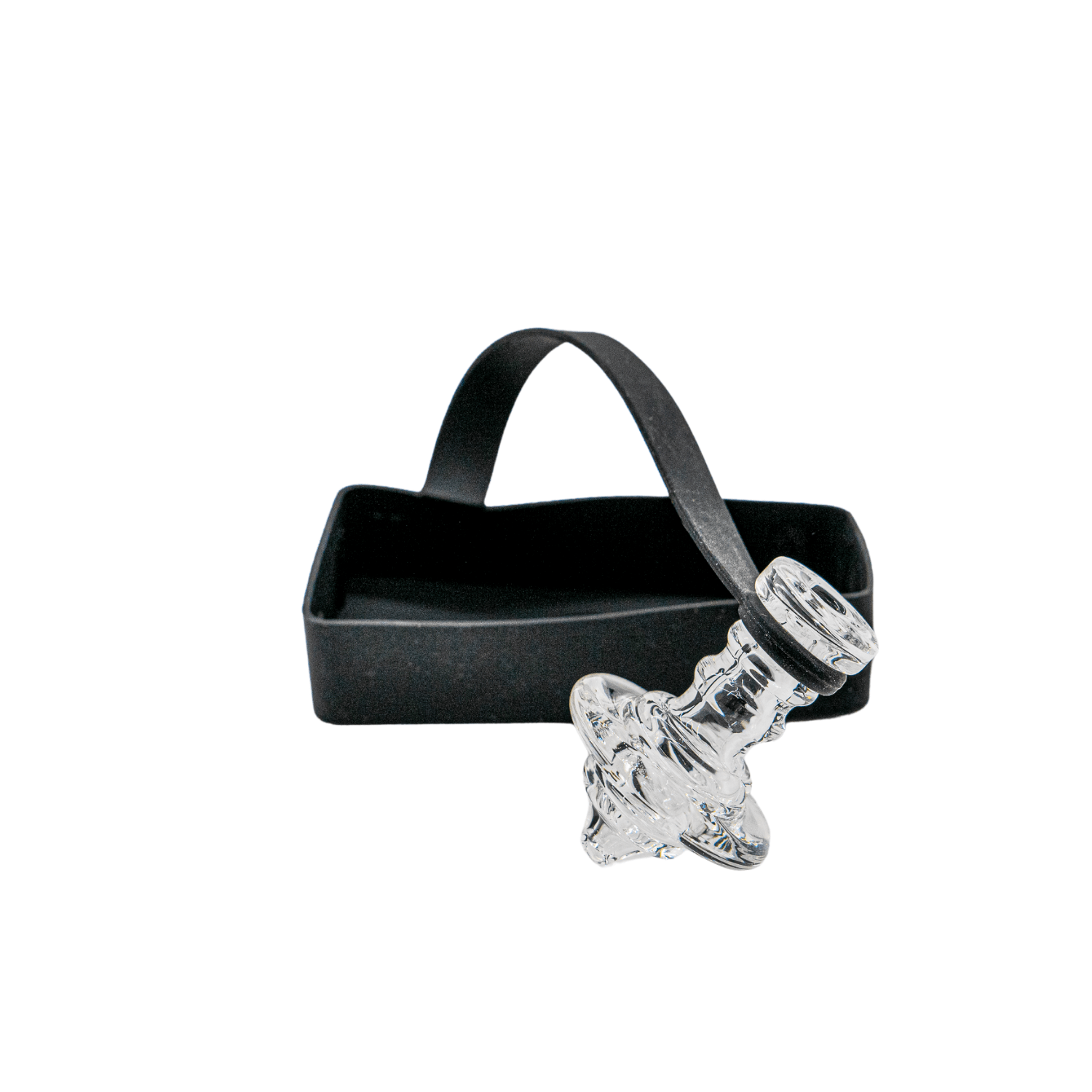 A close-up shot of the RiO Tethered Silicone Sleeve resting inside its black protective case.