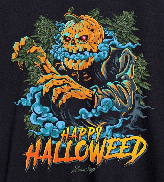 Front-facing graphic of a grinning jack-o'-lantern monster surrounded by blue smoke and green foliage on the Happy Halloweed Tee.