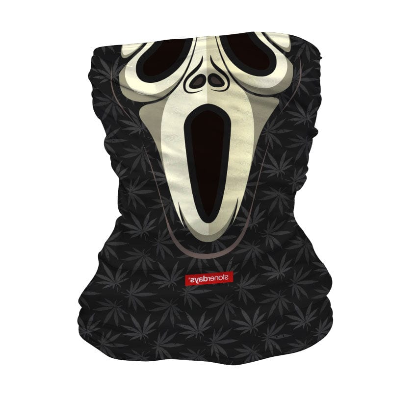 Front view of the Wazzzup Halloweed Gaiter, showing a spooky skull design on a dark fabric background.