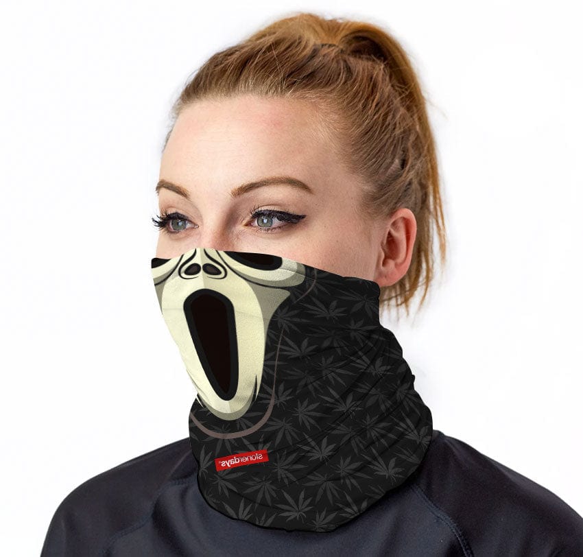A front view of the Wazzzup Halloweed Gaiter, featuring a spooky, open-mouthed design in a dark color scheme.