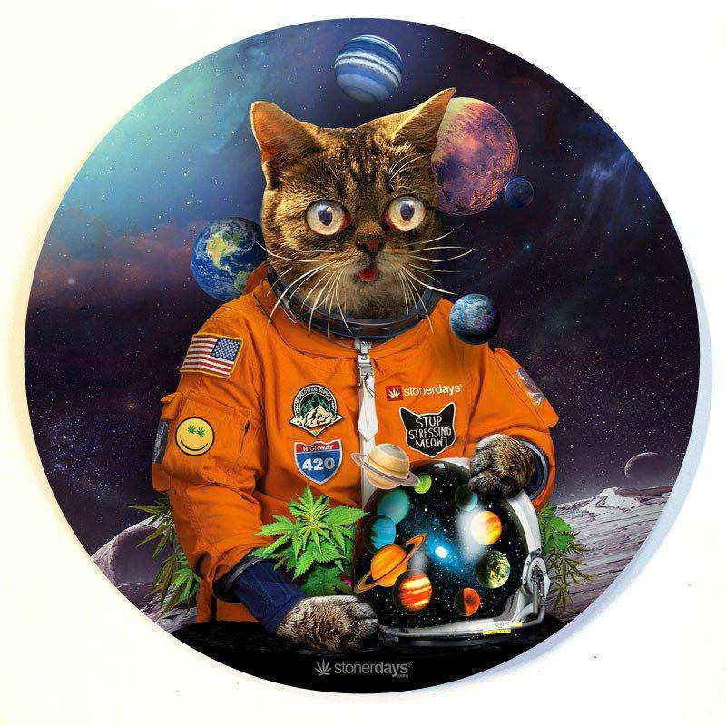 A cosmic view of the Stonerdays Round Dab Mats featuring a cat astronaut amidst planets and stars.