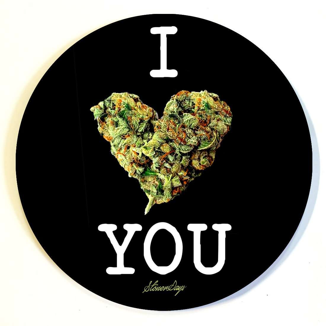 Holiday Themed Dab Mats display a vibrant, close-up view of a cannabis bud forming the letters “YOU” against a solid black background.