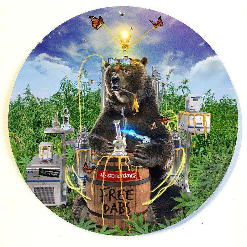 A whimsical composition featuring the Stonerdays Round Dab Mats with a bear amidst vibrant greenery and fantastical elements.