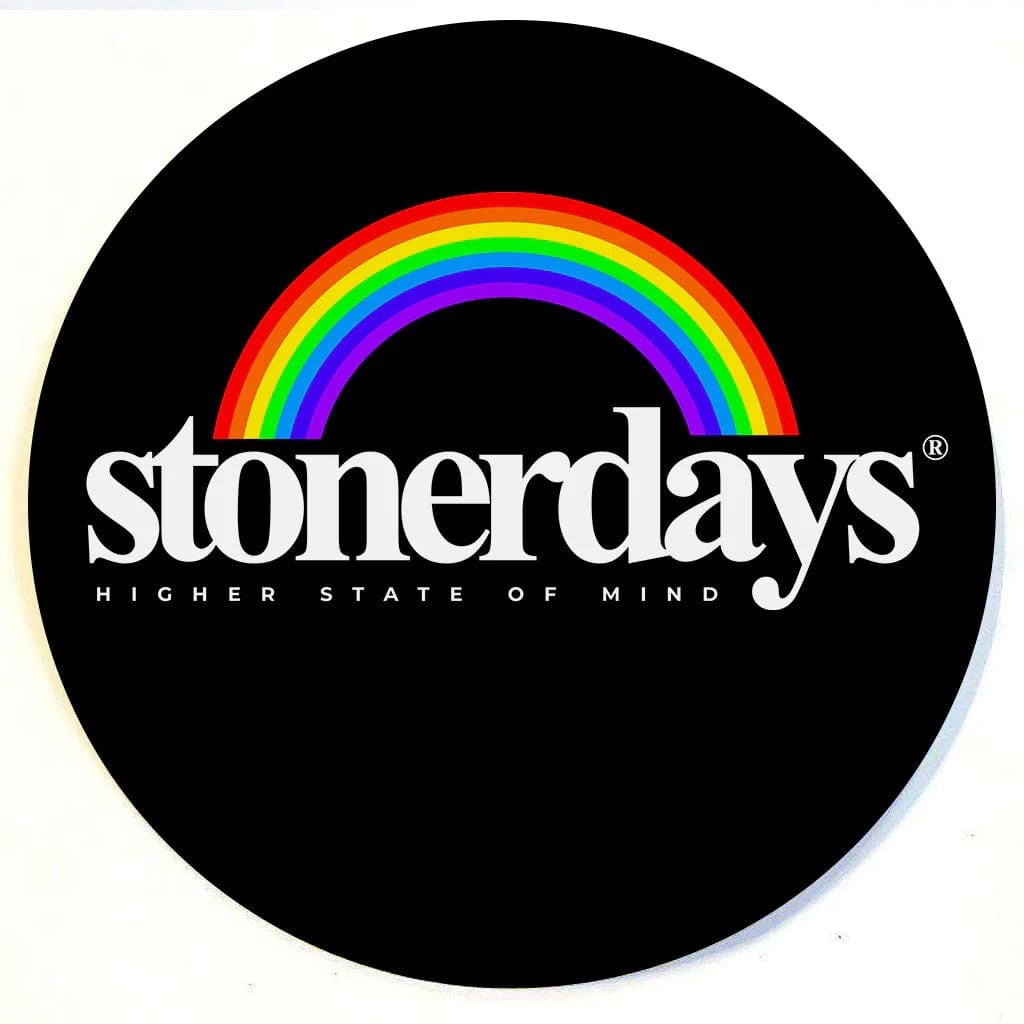 A top-down view of the circular Stonerdays Round Dab Mats, showcasing a black surface with white branding.