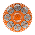 Top-down view of the orange Storz & Bickel Dosing Capsule Magazine showing seven circular metal dosing capsules arranged around a central hub.