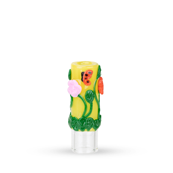 Center-frontal view of the bright yellow Hose Tip Garden Variety with raised green vines and pink and orange flower decorations on a white studio background